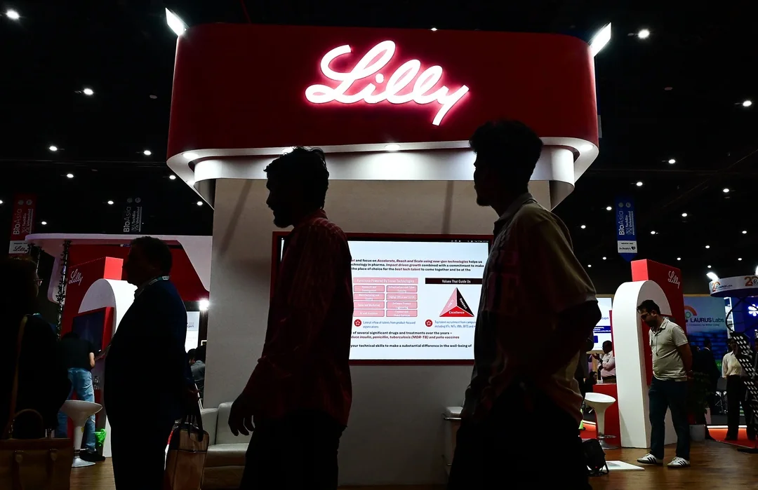 Visitors examine the Eli Lilly kiosk at BioAsia 2026.